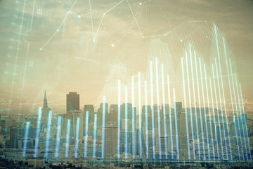 Forex graph on city view with skyscrapers background multi exposure. Financial analysis concept.