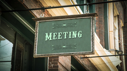 Street Sign to Meeting