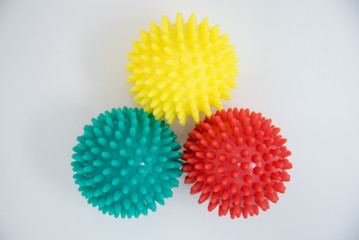 Massage balls. Three different colored balls on a white background.