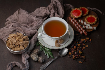 Tea in a cup on an old background