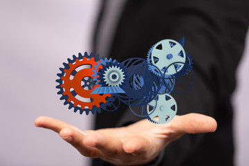 Business, Internet and technology concept. Business select gear icon on virtual screen.