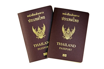 Two Thailand passports isolate on white background.