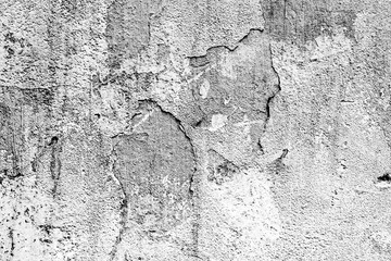 Texture of a concrete wall with cracks and scratches which can be used as a background