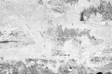 Texture of a concrete wall with cracks and scratches which can be used as a background