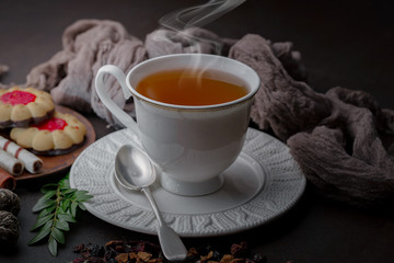 Tea in a cup on an old background