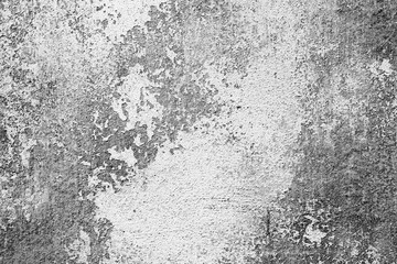 Texture of a concrete wall with cracks and scratches which can be used as a background