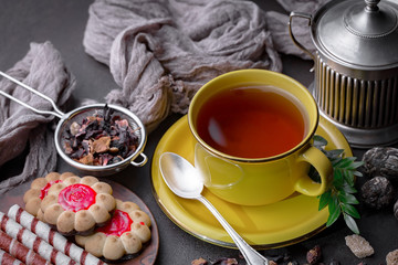Tea in a cup on an old background