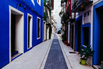 Fototapeta premium colorful street with no people in south spain. blue colors