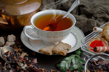 Tea in a cup on an old background