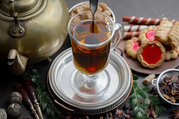 Tea in a cup on an old background