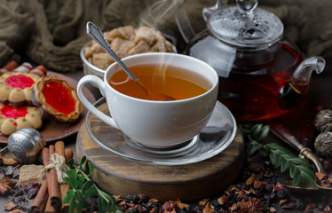 Fototapeta na wymiar Tea in a cup on an old background