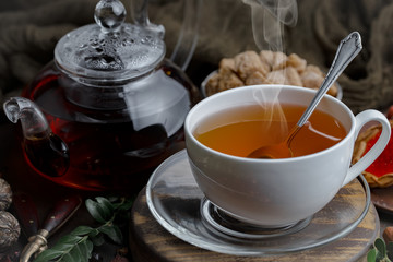 Tea in a cup on an old background