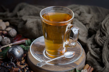 Tea hot drink on old background in composition on the table