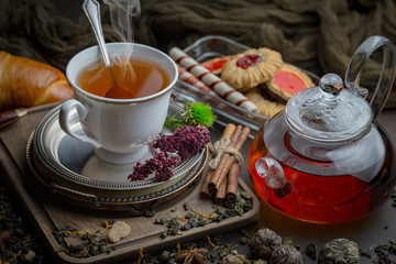 Tea in a cup on an old background