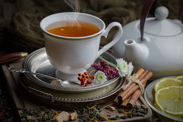 Tea in a cup on an old background