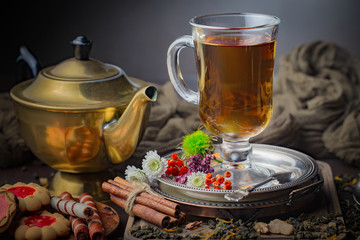 Tea in a cup on an old background