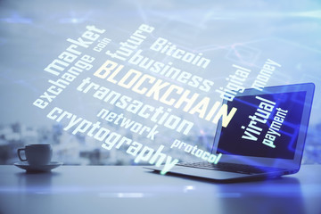 Double exposure of blockchain theme hologram and table with computer background. Concept of bitcoin...