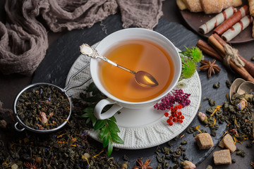 Tea in a cup on an old background