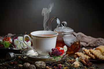 Tea in a cup on an old background