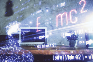Obraz premium Desktop computer background and formula hologram writing. Double exposure. Education concept.
