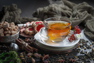 Tea in a cup on an old background