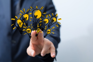 idea lamp concept in hand.