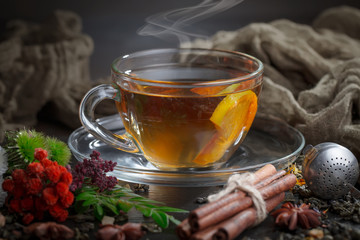 Tea hot drink on old background in composition on the table