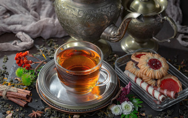 Tea in a cup on an old background