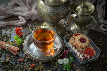 Tea in a cup on an old background