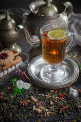 Tea in a cup on an old background