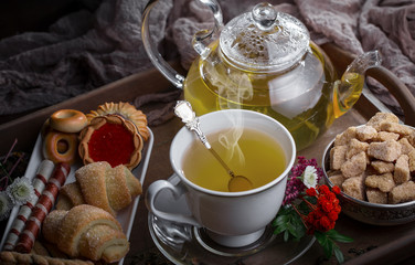 Tea in a cup on an old background