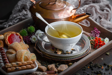 Tea in a cup on an old background