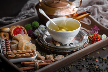 Tea in a cup on an old background
