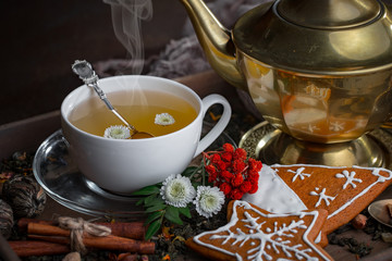 Tea in a cup on an old background