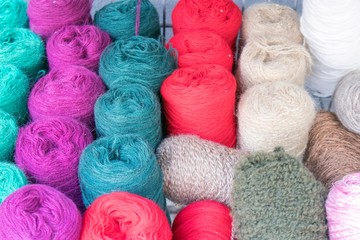 Multi-colored woolen threads in wooden box for sale