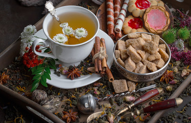 Tea in a cup on an old background