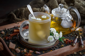 Tea hot drink on old background in composition on the table