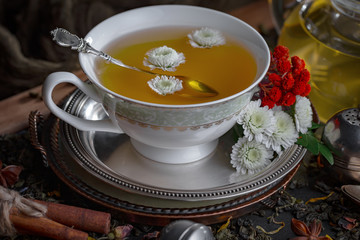 Tea in a cup on an old background