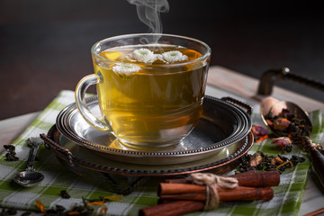 Tea in a cup on an old background