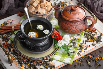 Tea in a cup on an old background