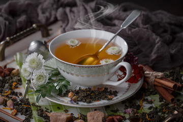 Tea in a cup on an old background