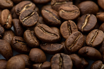 Coffee beans close-up background. Fresh roasted