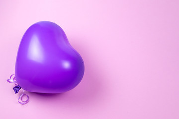 Purple ballon on purple background.