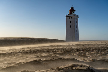 Lighthouse Rudbjerg knude in Denmark on a stormy day