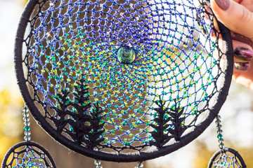 Handmade dream catcher with feathers threads and beads rope hanging