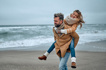 Family on the beach near the sea
