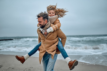 Family on the beach near the sea