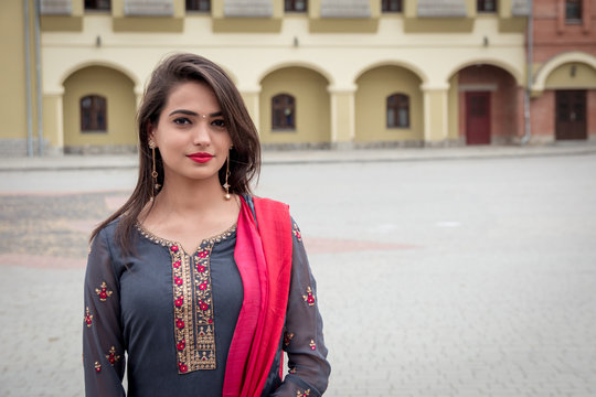 Portrait of indian girl in traditional dress. Traditional accessories of Indian girls.