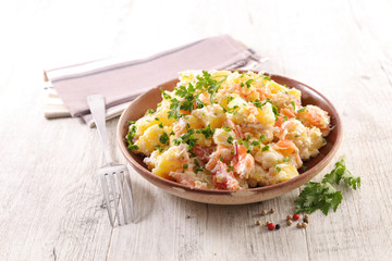 potato salad with salmon, cream and herbs