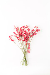 Red wildflowers bouquet on white background.
